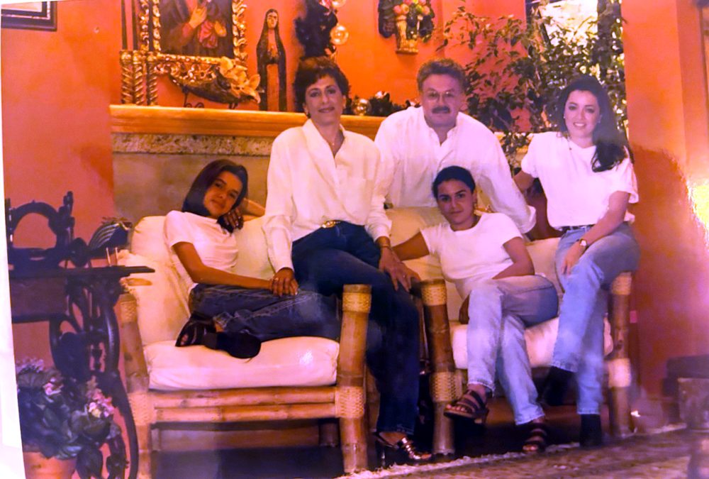 The family on a bamboo sofa at home