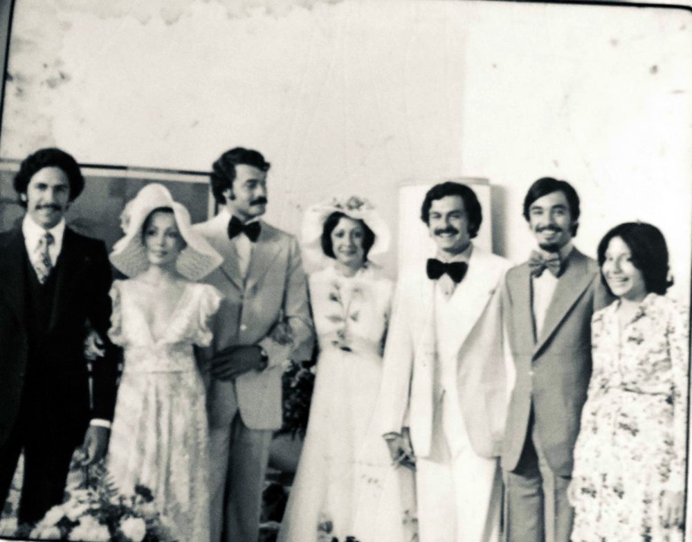Black and white wedding party photo from the 1970s